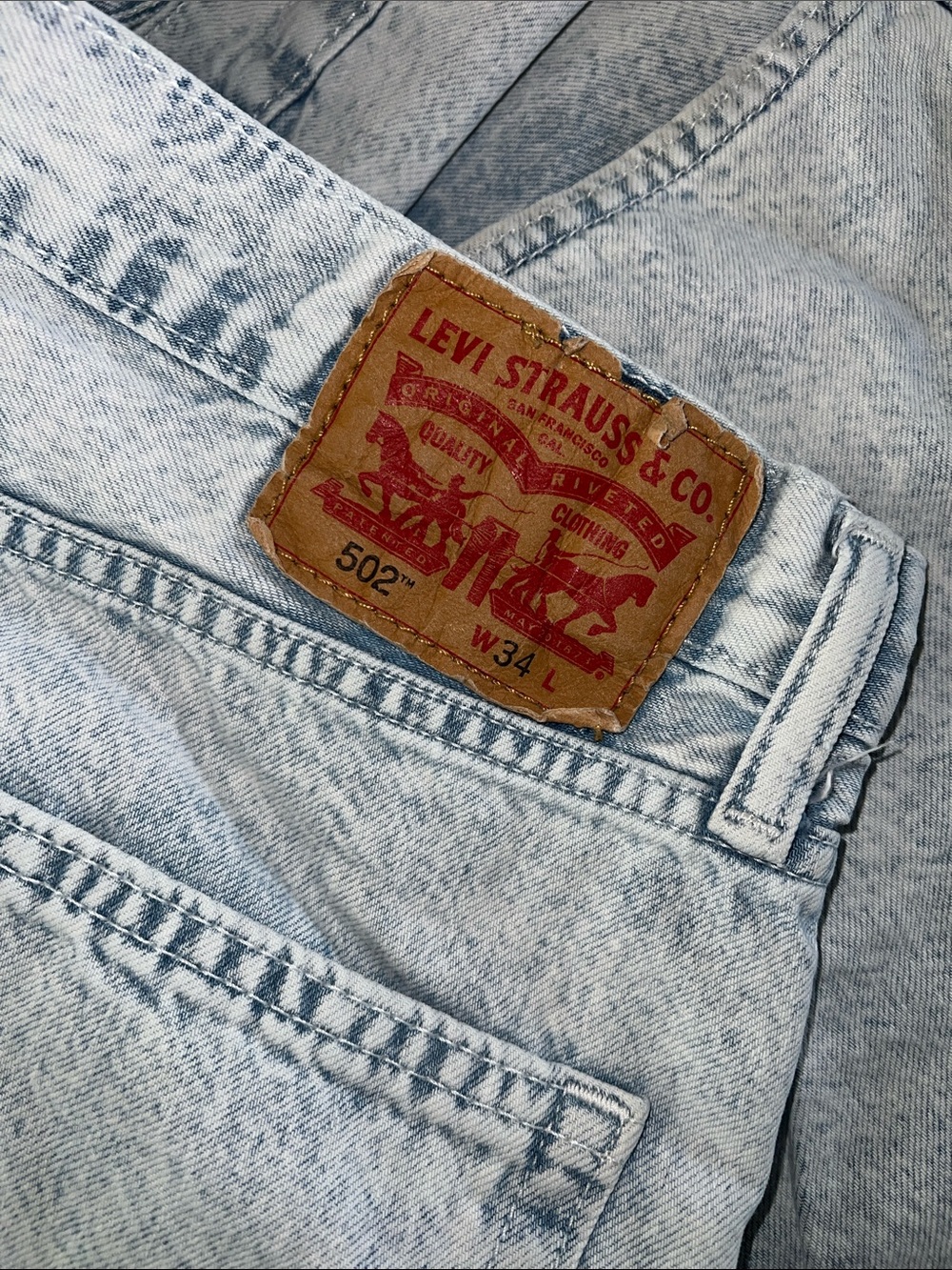 Levi's 502™ Relaxed Light Wash Blue Jeans with Leather Patch